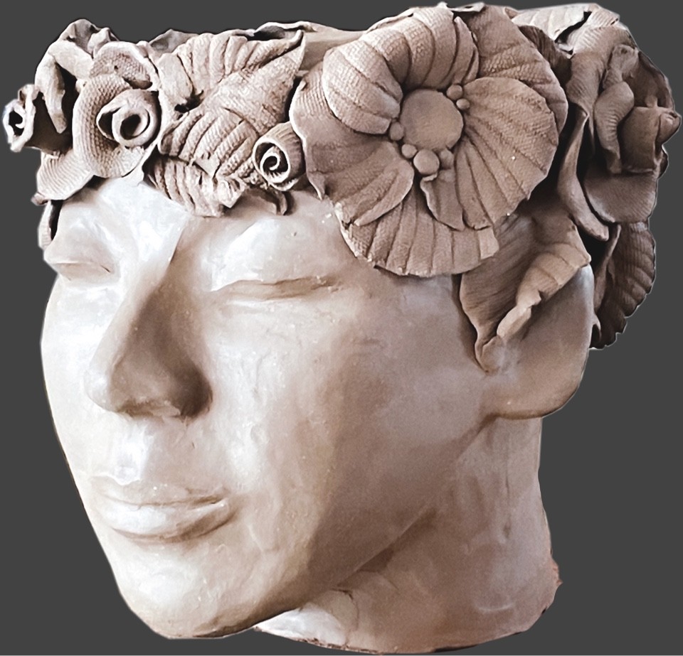 Vase en tête de femme